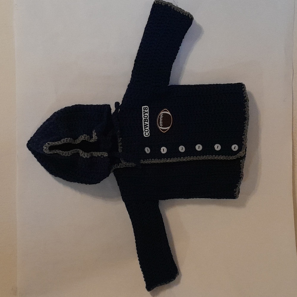 A navy blue baby hoodie.